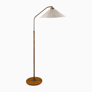 Swedish Modern Floor Lamp in Rattan and Brass, 1940s