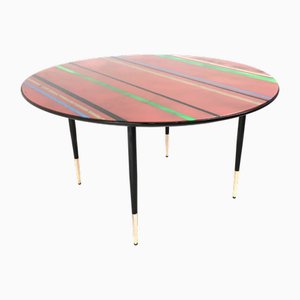 Mesa de centro redonda con superficie de vidrio a rayas rojas, años 50