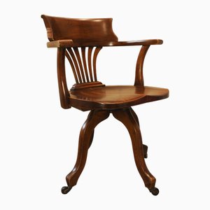 Silla de escritorio giratoria inglesa antigua de caoba, década de 1890