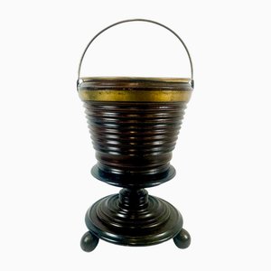 Secchiello Regency in legno di mogano ebanizzato con rivestimento in ottone, XIX secolo