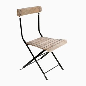 Silla plegable de madera y metal