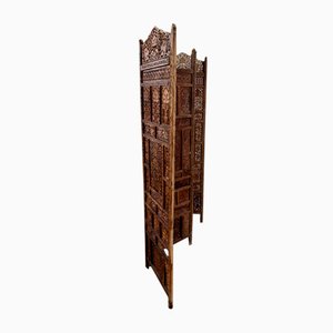Paravento anglo-indiano in legno intagliato, fine XIX secolo