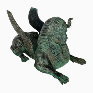Mesa Sphinx de bronce con tablero de vidrio