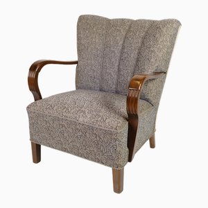 Juego de sillones de madera oscura con tapicería floral, años 60