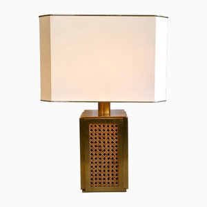 Lámpara de mesa Mid-Century de ratán tejido y latón al estilo de Christian Dior, años 70