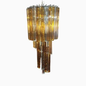 Lámpara de araña en cascada Trilobi de cristal de Murano en blanco y ámbar atribuida a Paolo Venini, años 60