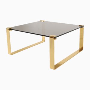 Mesa de centro Mid-Century moderna con base dorada y superficie de vidrio, años 70