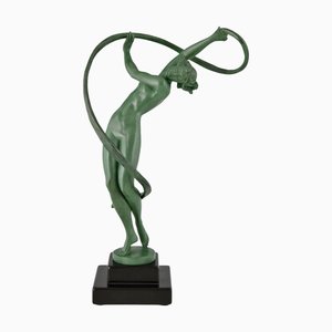 Pierre Le Faguays / Fayral, Escultura Tourbillon Art Déco de bailarina desnuda, 1930, metal y mármol
