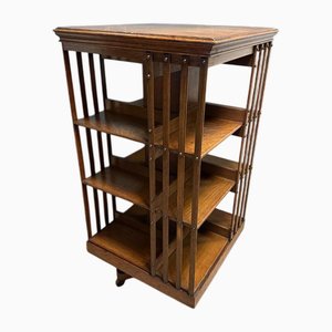 Librería giratoria antigua de roble