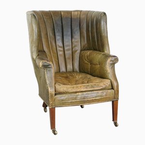 Large Antique Barrel Back Wing Chair in Leather