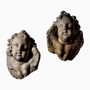 Barocke Engelsköpfe aus Marmor, Italien, Mitte 18. Jh., 2er Set