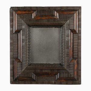 Italienischer Spiegel mit ebonisiertem Ripple-Rahmen, 17. Jh.