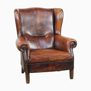 Großer Cognacfarbener Vintage Ohrensessel aus Schafsleder