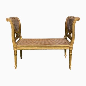 Banco Luis XVI pequeño de madera dorada y cannage