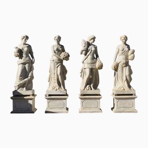 Four Seasons, Ende 20. Jh., Marmorskulpturen auf Marmorsockel, 4 . Set