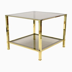 Mesa auxiliar Hollywood Regency de latón de vidrio ahumado, siglo XX, 1970