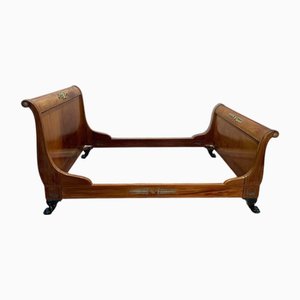 Cama Imperio de caoba y bronce