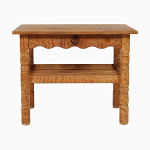 Dänischer Beistelltisch aus Eiche mit Schublade und Ablage im Stil von Henning Kjærnulf, 1970er