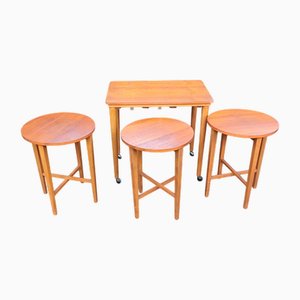 Mesa de centro danesa vintage con ruedas y mesas nido de Poul Hundevad para Hundevad & Co., años 50. Juego de 4