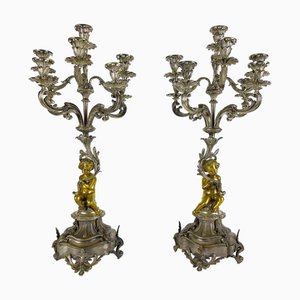 Portacandele a otto braccia in bronzo argentato con putti dorati, Italia, set di 2