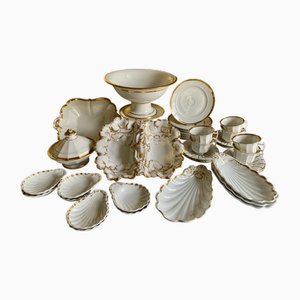 Juego de vajilla de postre antigua de porcelana, 1810. Juego de 36