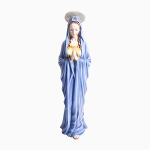 Immagine di un santo in porcellana, 1930