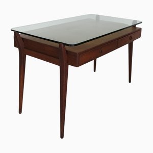 Escritorio italiano de madera con tablero de vidrio, años 50