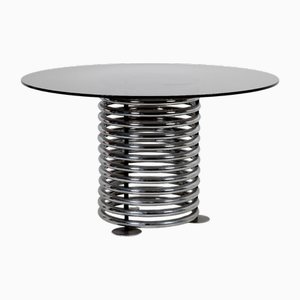 Mesa de comedor redonda de vidrio