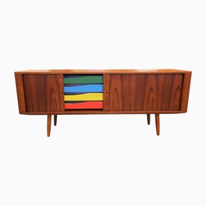 Teak Sideboard with Shutters and Colored Drawers by Bruno Hansen, 1960s
