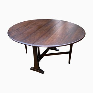 Vintage Folding Dining Table in Dark Elm from Ercol, 1960s