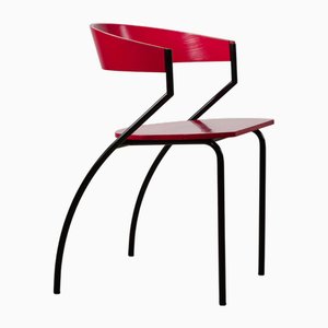 Red Plywood and Curved Metal Frame Chair