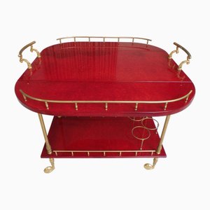 Carrito de bebidas en rojo brillante de piel de cabra con alas de Aldo Tura