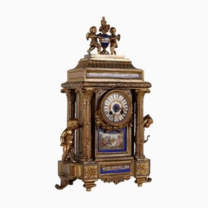 Antique Mantel Clock in Gilded Metal and Porcelain 19th-20th Century