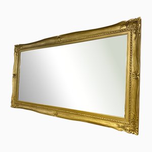 Espejo grande de madera y estuco dorado, años 20