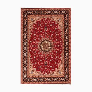 Handgeknüpfter orientalischer Woll- und Seidenteppich mit dekorativem Muster
