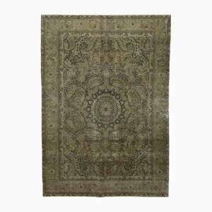 Tappeto vintage mediorientale annodato a mano con decorazioni originali