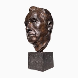 Cabeza de hombre de bronce, de principios del siglo XX, bronce sobre base de mármol