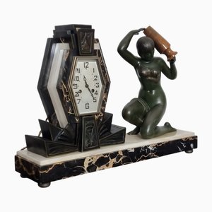 Orologio Art Déco illuminato con scultura porta acqua, anni '30