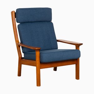 Poltrona blu in tessuto e legno di Glostrup