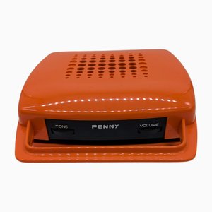 Tocadiscos Penny en naranja de Mario Bellini para MusicalNastro. Italia, años 80