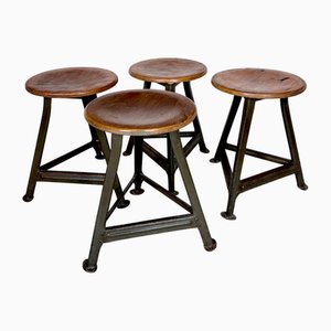 Industrielle Atelier Hocker mit Stahlgestell & Sitzen aus Schichtholz, Deutschland, 1920er, 4 . Set