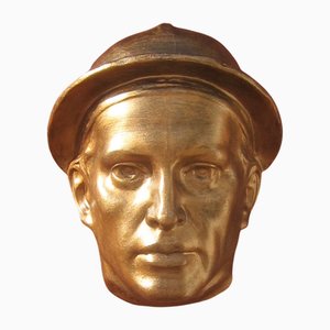 Máscara escultural de pared de cerámica de bronce patinado de Victor Voets, Bélgica, años 30