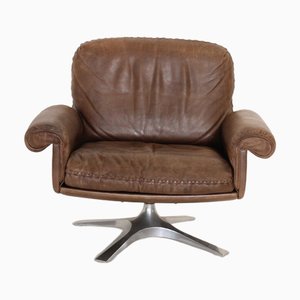 Poltrona DS 31 girevole in pelle di De Sede