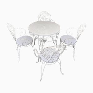 Mesa y sillas de jardín. Juego de 4