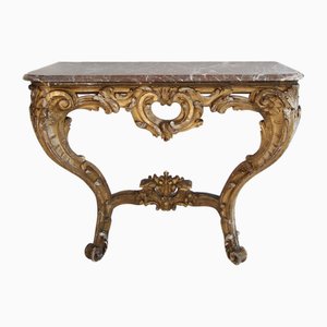 Consolle in stile Luigi XV in legno dorato intagliato con ripiano in marmo, XIX secolo