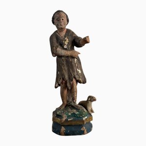 Estatuilla de madera policromada con representación de un sujeto religioso, siglo XVIII