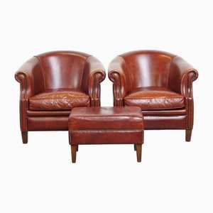 English Cognac-Colored Cowhide Leather Club Chairs and Ottoman, Set of 3