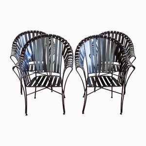 Sillas de jardín modernistas esculturales con correas de hierro, años 80. Juego de 4