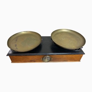 Báscula de madera y latón, década de 1890