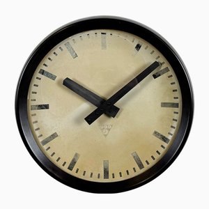 Orologio da parete industriale in bachelite marrone di Pragotron, anni '60